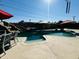 Inviting backyard oasis featuring a sparkling pool and spa at 3125 W Mclellan Blvd, Phoenix, AZ 85017