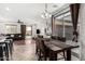 Dining room with wood table, six chairs, and a sliding glass door to backyard at 3451 E Tyson St, Gilbert, AZ 85295