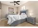 Guest bedroom with a bed and built-in storage at 3554 N Hooper St, Buckeye, AZ 85396