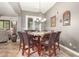 Elegant dining room with a large table and chandelier at 3554 N Hooper St, Buckeye, AZ 85396