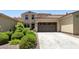 Two-story home with a two-car garage and manicured landscaping at 3554 N Hooper St, Buckeye, AZ 85396