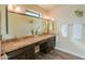 Double vanity bathroom with granite countertop at 4027 E Pueblo Ave, Mesa, AZ 85206