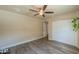 Bedroom with ceiling fan and double door closet at 4027 E Pueblo Ave, Mesa, AZ 85206