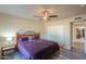 Bedroom with ceiling fan and view of kitchen at 4027 E Pueblo Ave, Mesa, AZ 85206