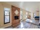 Brick fireplace as a focal point in the open living space at 4027 E Pueblo Ave, Mesa, AZ 85206