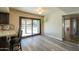 Kitchen with granite counters, dark wood cabinets & sliding doors to the pool at 4027 E Pueblo Ave, Mesa, AZ 85206