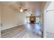 Living room with vaulted ceiling, fireplace and two ceiling fans at 4027 E Pueblo Ave, Mesa, AZ 85206