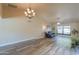 Bright living room featuring hardwood floors and a comfortable seating area at 4027 E Pueblo Ave, Mesa, AZ 85206