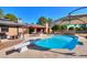 Relaxing pool area, complete with diving board and patio furniture at 4027 E Pueblo Ave, Mesa, AZ 85206