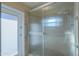 Shower with glass door and grab bar at 4027 E Pueblo Ave, Mesa, AZ 85206