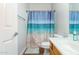 Bathroom with shower/tub combo and ocean-themed decor at 4332 E Vallejo Ct, Gilbert, AZ 85298