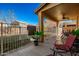 Relaxing patio with seating area and a ceiling fan at 4332 E Vallejo Ct, Gilbert, AZ 85298