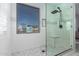 Large walk-in shower with a mosaic tile floor and glass enclosure at 4332 E Vallejo Ct, Gilbert, AZ 85298