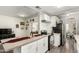 Modern kitchen with white cabinets and appliances at 4608 N 12Th Pl, Phoenix, AZ 85014