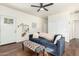 Living room with blue couch and entryway view at 4608 N 12Th Pl, Phoenix, AZ 85014