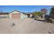 Charming ranch home with a well-maintained front yard and attached garage at 4938 W Michelle Dr, Glendale, AZ 85308