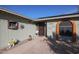 Inviting front entry with a decorative door and charming landscaping at 4938 W Michelle Dr, Glendale, AZ 85308