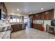 Bright kitchen with granite counters, stainless steel appliances, and ample cabinet space at 4938 W Michelle Dr, Glendale, AZ 85308