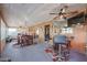 Sunroom with wet bar and dining area at 4938 W Michelle Dr, Glendale, AZ 85308