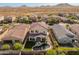 Aerial view of a home with a pool and backyard landscaping at 518 E Balao Dr, Phoenix, AZ 85085