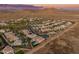 Aerial view of a residential neighborhood with desert landscape at 518 E Balao Dr, Phoenix, AZ 85085