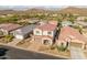 Aerial view of a two-story home with a tile roof and landscaped yard at 518 E Balao Dr, Phoenix, AZ 85085