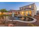 Beautiful backyard with a sparkling pool and relaxing lounge chairs at 518 E Balao Dr, Phoenix, AZ 85085