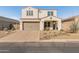 Two-story home with a two-car garage and well-landscaped yard at 518 E Balao Dr, Phoenix, AZ 85085