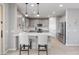 Modern kitchen with gray cabinets, white quartz countertops, and stainless steel appliances at 518 E Balao Dr, Phoenix, AZ 85085