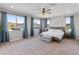 Spacious main bedroom with mountain views and plush carpeting at 518 E Balao Dr, Phoenix, AZ 85085