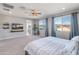 Spacious main bedroom with mountain views and ensuite bathroom at 518 E Balao Dr, Phoenix, AZ 85085