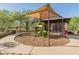 Community playground with shade structure and play equipment at 518 E Balao Dr, Phoenix, AZ 85085