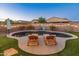 Stunning kidney-shaped pool surrounded by a beautifully landscaped yard at 518 E Balao Dr, Phoenix, AZ 85085