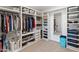 Large walk-in closet with ample shelving and hanging space at 518 E Balao Dr, Phoenix, AZ 85085