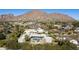 Aerial view of house, pool, and surrounding landscape at 5301 E Calle Del Norte --, Phoenix, AZ 85018