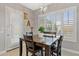 Casual breakfast nook with a table and chairs near a kitchen at 5622 S Tobin Ave, Mesa, AZ 85212