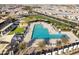 Aerial view of community pool with surrounding lounge chairs at 5622 S Tobin Ave, Mesa, AZ 85212