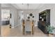 Elegant dining room features a wood table, gray chairs, and a hutch at 5622 S Tobin Ave, Mesa, AZ 85212