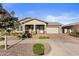 Single-story home with covered porch and two-car garage at 5622 S Tobin Ave, Mesa, AZ 85212