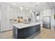 Spacious kitchen featuring white shaker cabinets and a large island at 5622 S Tobin Ave, Mesa, AZ 85212