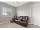 Relaxing sitting area featuring a leather recliner and ottoman at 5622 S Tobin Ave, Mesa, AZ 85212