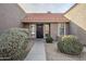 Front entry of a home with a walkway and shrubs at 5821 W Kesler St, Chandler, AZ 85226