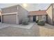 Front view of a house with a garage and well-maintained landscaping at 5821 W Kesler St, Chandler, AZ 85226