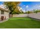 Putting green and partially-fenced backyard at 6131 E Kings Ave, Scottsdale, AZ 85254