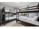 Bedroom with bunk beds, ample sleeping space and window at 6131 E Kings Ave, Scottsdale, AZ 85254