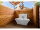 Enjoy this relaxing outdoor bathtub setting at 6131 E Kings Ave, Scottsdale, AZ 85254