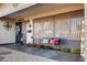 Welcoming front porch with a bench and festive decor at 723 S Edgewater Dr, Mesa, AZ 85208