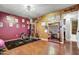 Home gym with fitness equipment and hardwood floors at 723 S Edgewater Dr, Mesa, AZ 85208