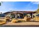 Mid-century modern home with a large patio and landscaping at 723 S Edgewater Dr, Mesa, AZ 85208