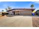 Ranch style home with a two car garage and curb appeal at 723 S Edgewater Dr, Mesa, AZ 85208